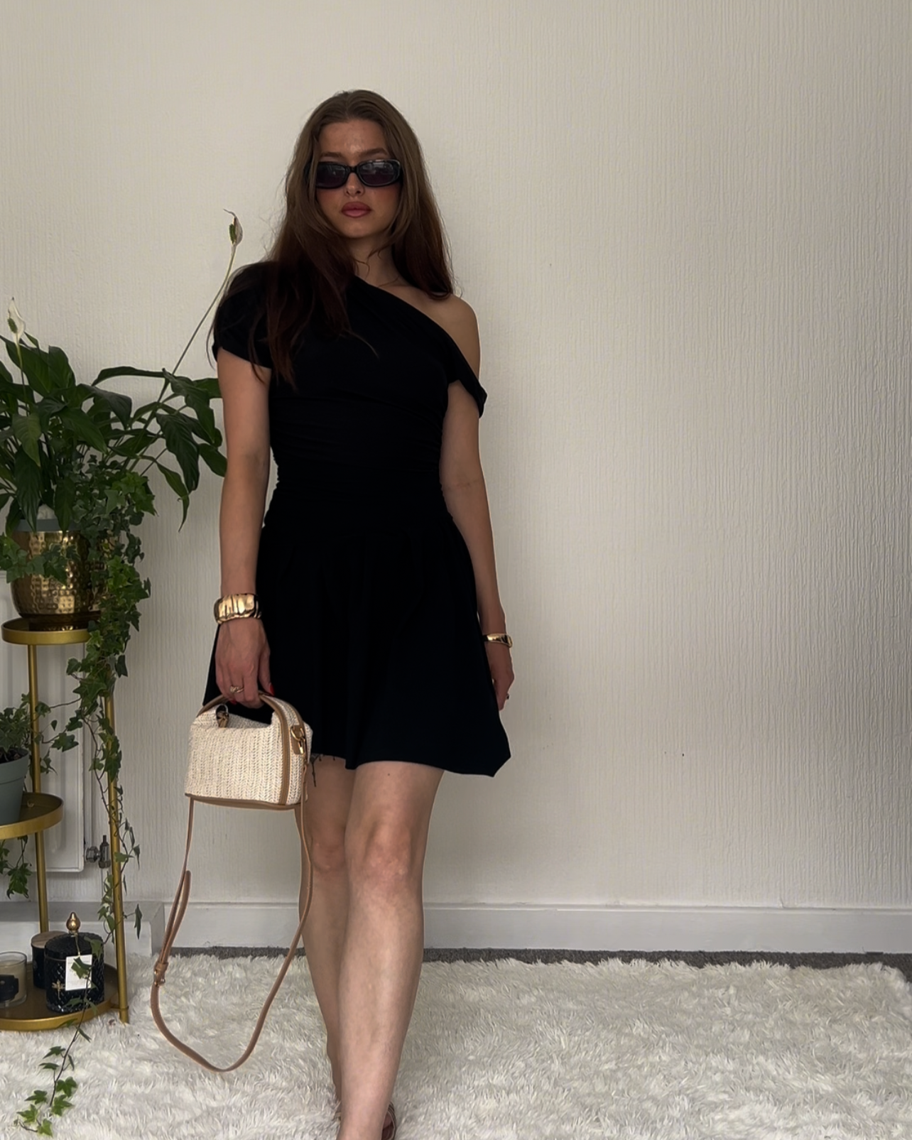 Nadéne Liora Black Pleated Asymmetrical Mini Skirt Front View